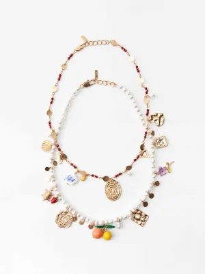 Pack of faux pearl and beaded necklaces with charms