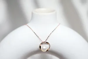 Pearl with rose gold halo