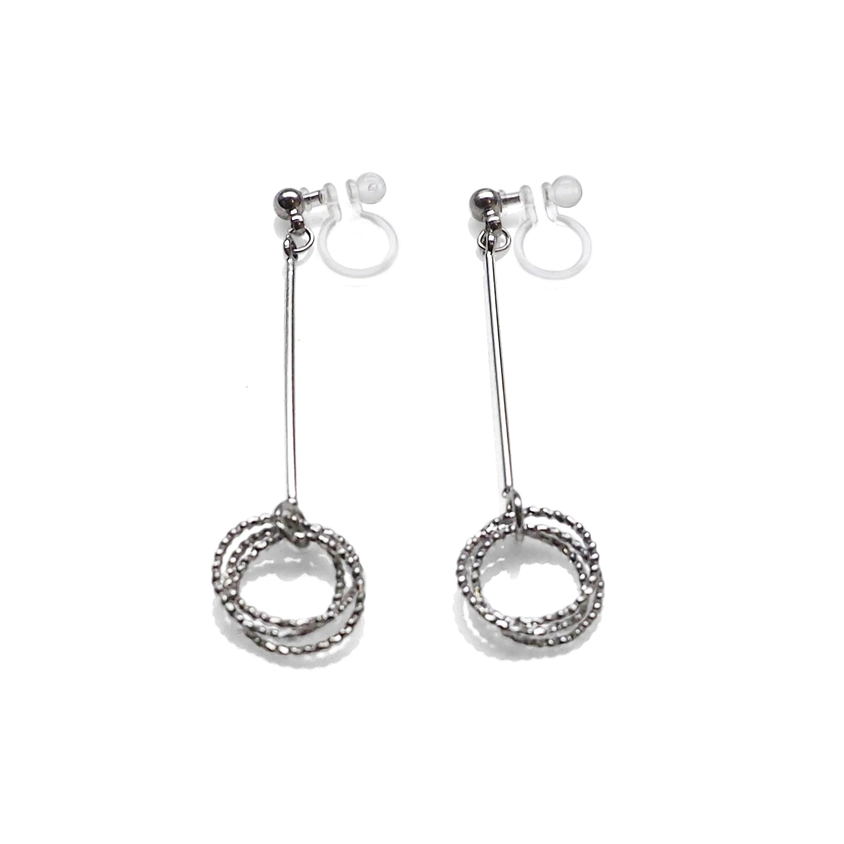 Textured triple hoop clip on earrings ( Silver tone )