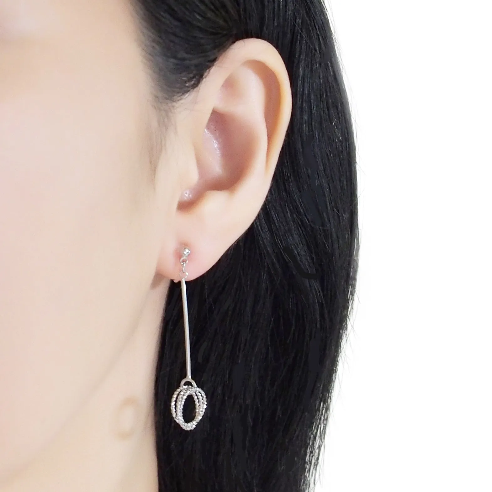 Textured triple hoop clip on earrings ( Silver tone )