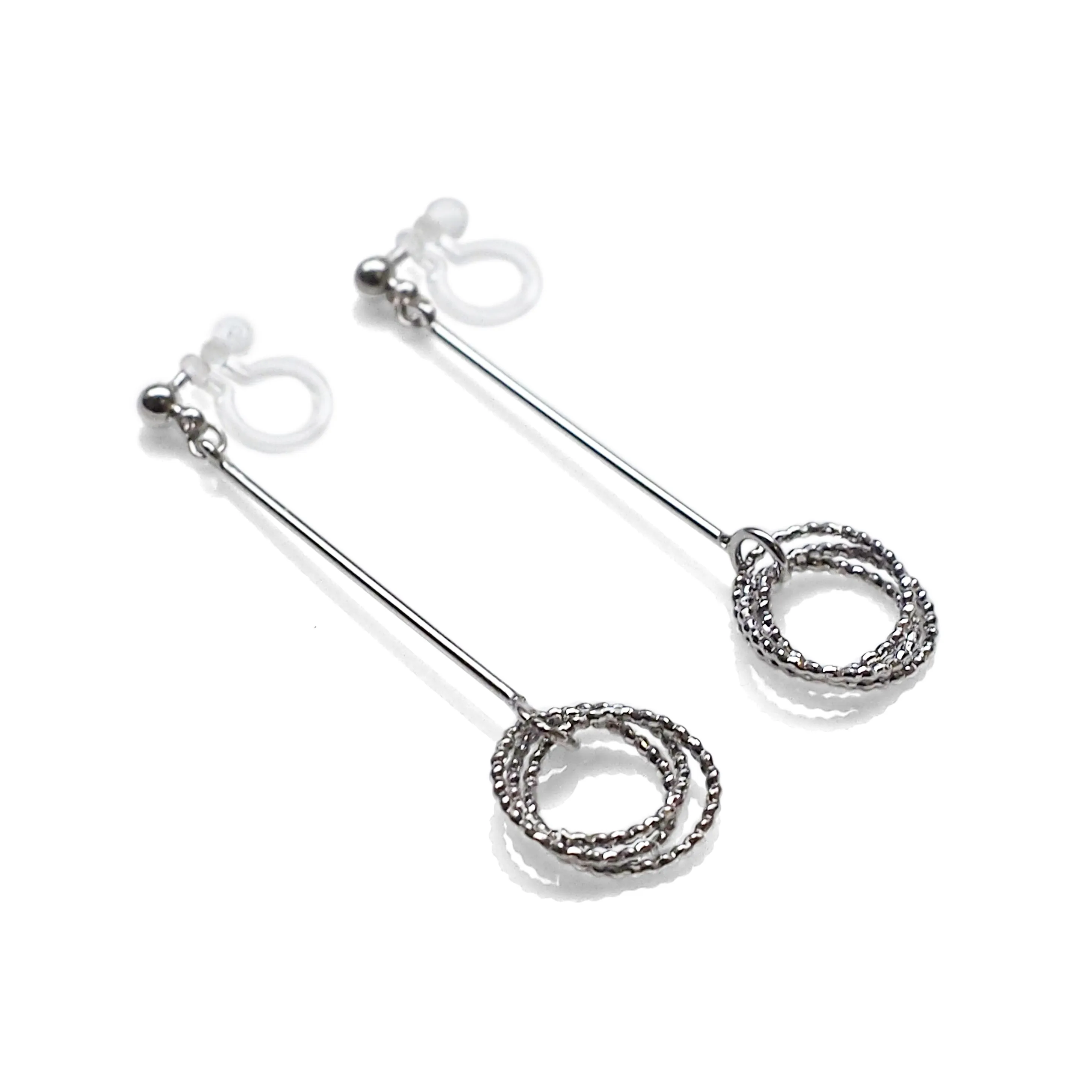 Textured triple hoop clip on earrings ( Silver tone )