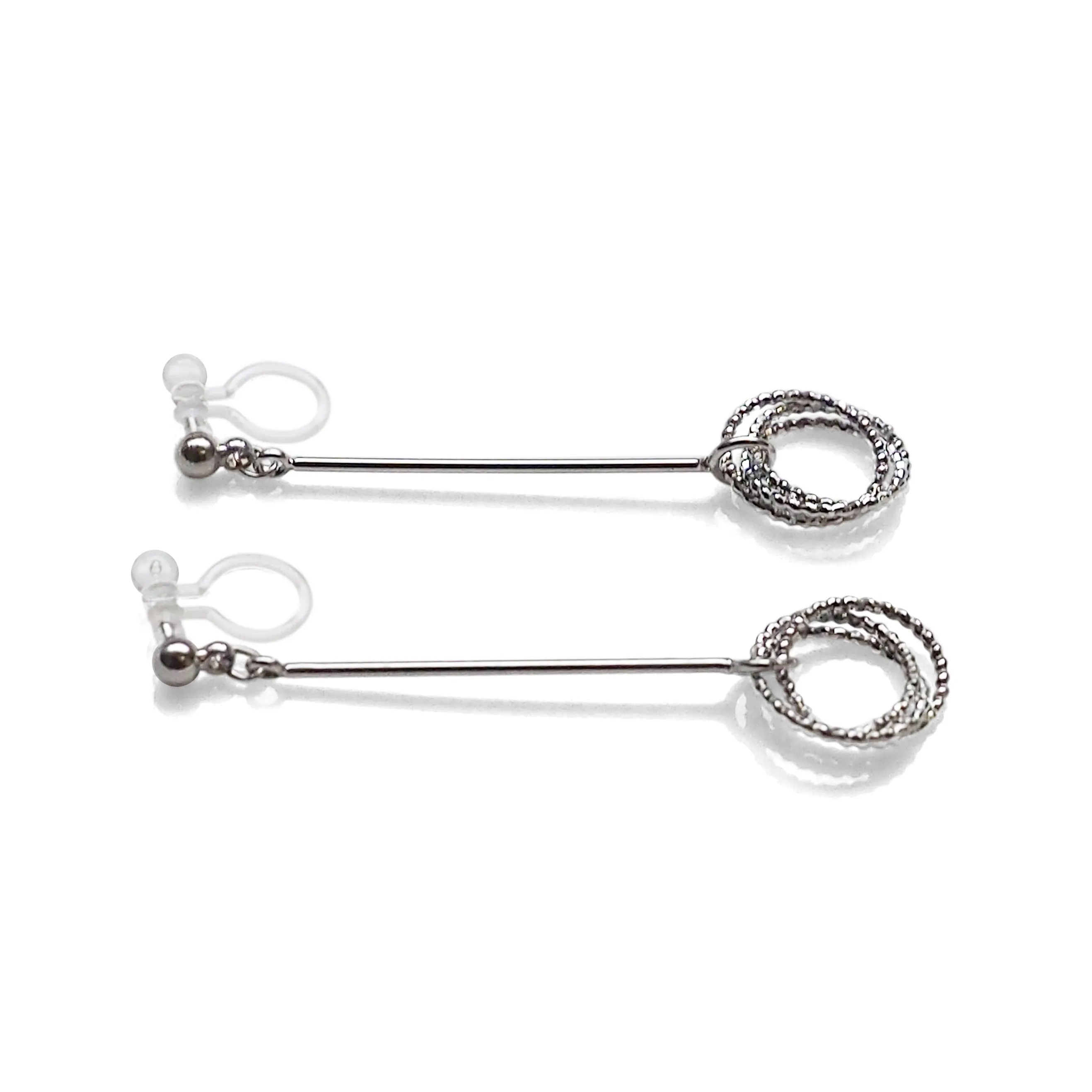 Textured triple hoop clip on earrings ( Silver tone )